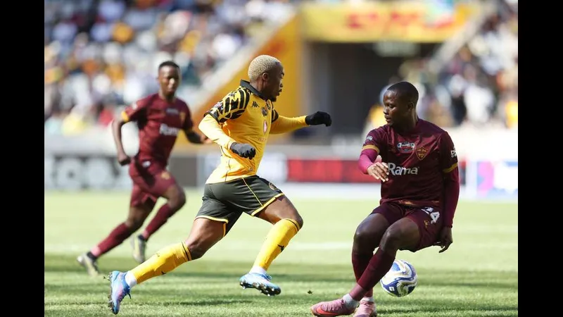 Cầu thủ Al Ittihad vượt qua cầu thủ Al Masry trong một tình huống tranh chấp trên sân cỏ Cầu thủ Al Ittihad vượt qua cầu thủ Al Masry trong một tình huống tranh chấp trên sân cỏ